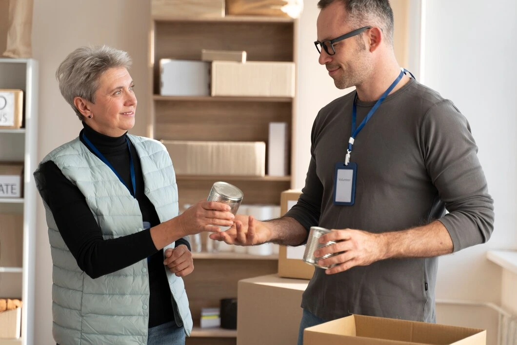 Property professional presenting packaged deal documents to smiling client in organized office space